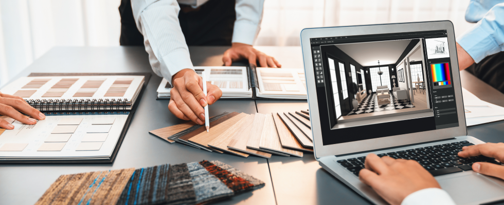 A hand points to a swatch showing potential room colors while a laptop displays a visualization of what the room will look like.